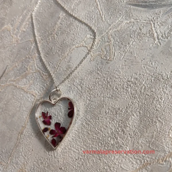 Heart-shape Clear Resin Pendant with Red Flower Elegance, Transparent Epoxy Jewelry for Parties, Home-ceremonies, Weddings and more
