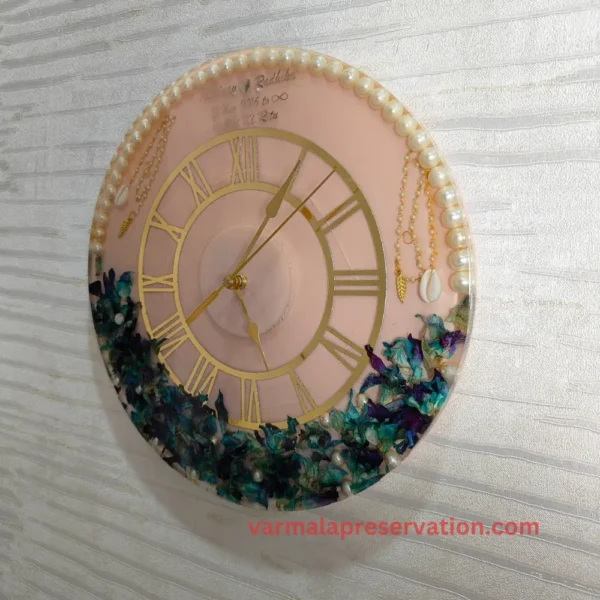 pink-blue-varmala-flower-wall-clock