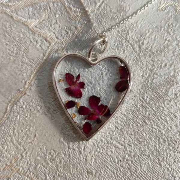 Crystal-clear-heart-shape-epoxy-resin-red-flower-pendant